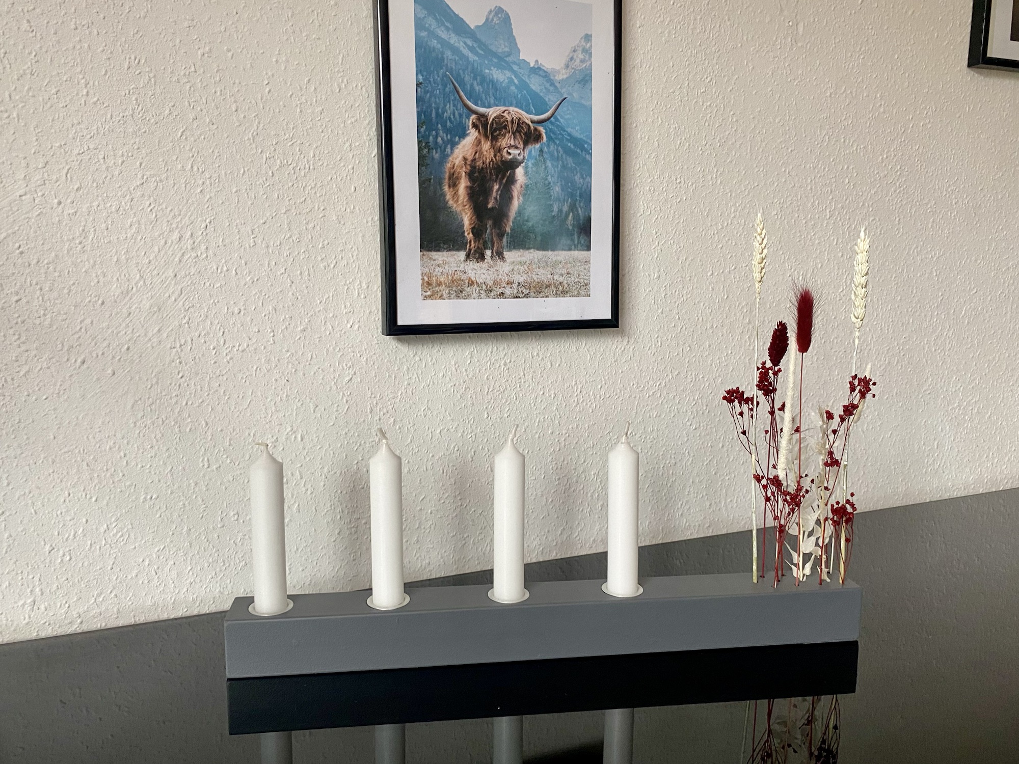 Wooden candle holder with dried flowers and 4 white stick candles